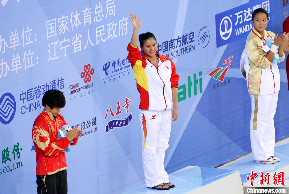 9月1日，广东队选手何姿在比赛中。当日，在第十二届全国运动会跳水项目女子3米板决赛中，何姿以392.45分的成绩夺得冠军。