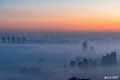 2019年6月10日，日落时分，浮山上俯瞰青岛，城区出现平流雾景观。